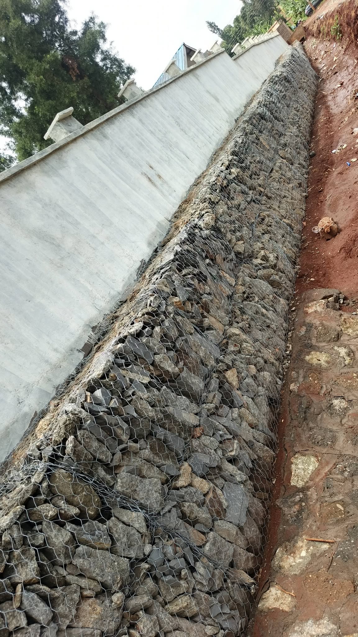 Gabion retaining wall protecting a property in Kenya